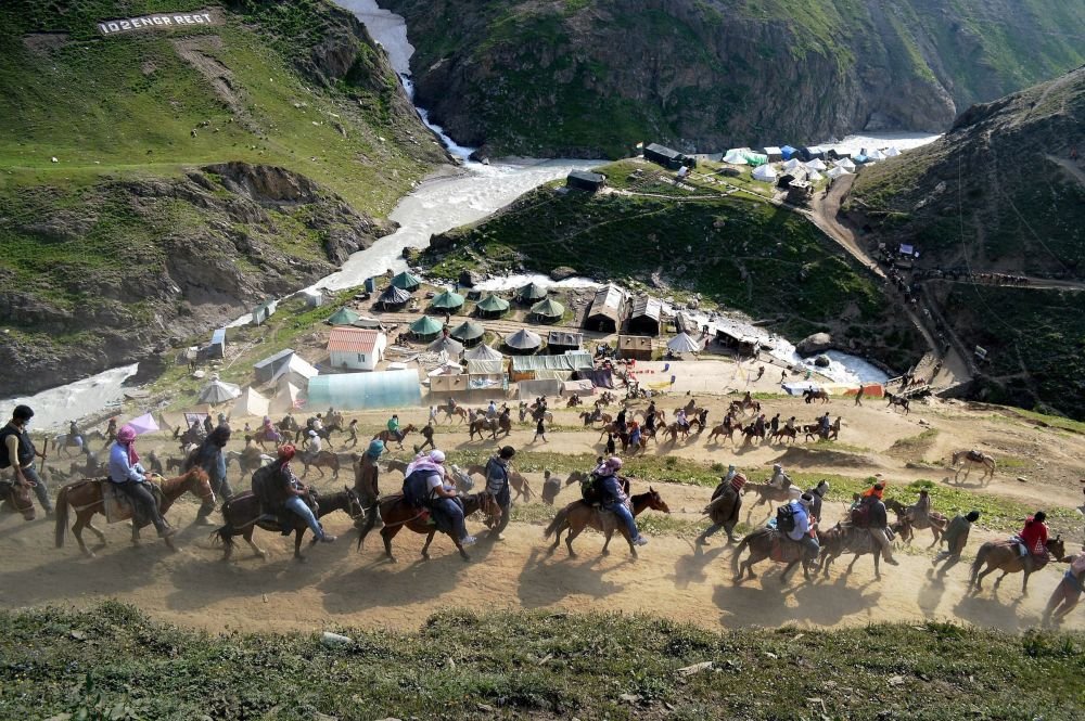 Amarnath pilgrims near cave shrine